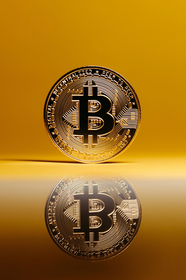 Person checking a cryptocurrency wallet address on a smartphone